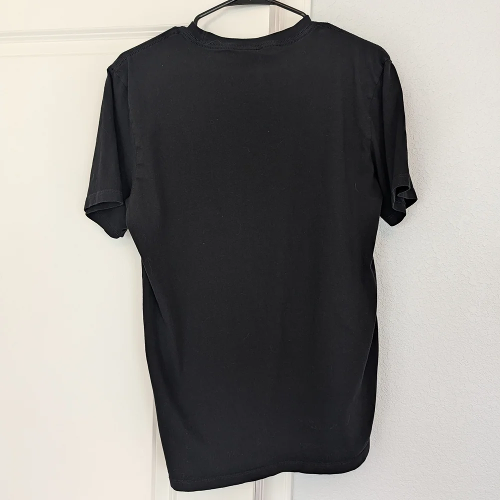 The North Face Black T-Shirt with Green Graphic
